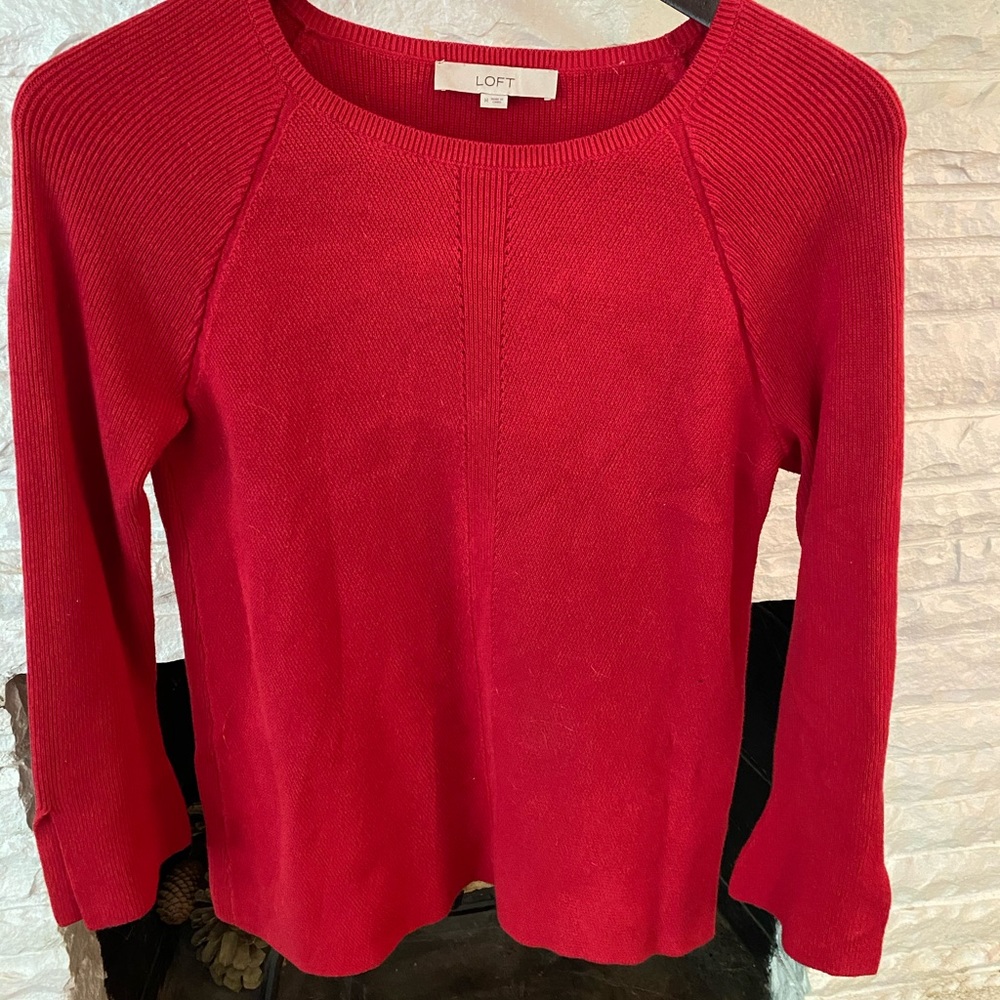 Split sleeve sweater